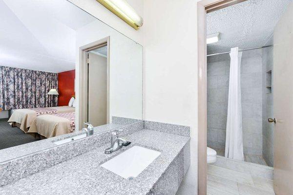 Two Double Beds Guest Bathroom