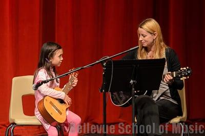 Whitney Pierce performing with a young student. Recital Dec. 2012