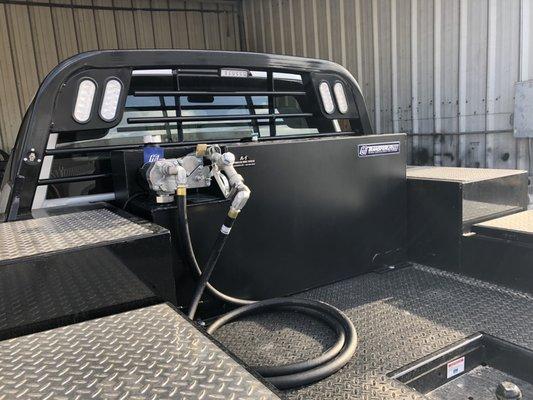 Transferflow refueling station in a custom truck body bed.