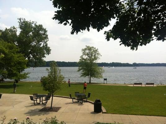 Lovely lawn and Reed Lake in the background. Sailboats.