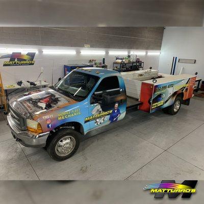 Matturros Service truck with a fully designed and custom commercial wrap.