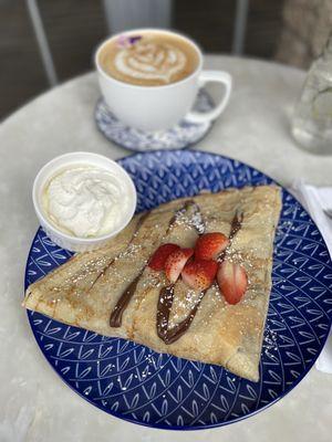 Nutella crepe with strawberries, banana and whipped cream (on the side)