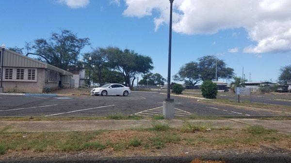 Parking lot with a lot of open spaces.