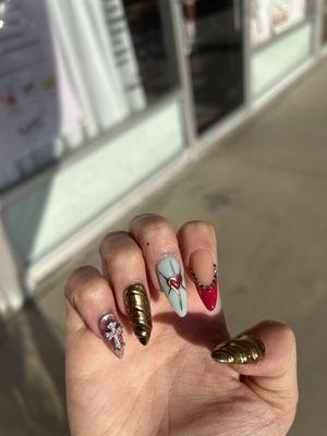 These are by far my favorite set ever , If you need your nails done & you love all kinds of design please ask for KYLIE SHE IS SO TALENTED.