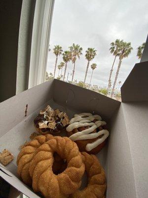 donuts, churro donuts and cinnamon roll