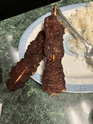 The beef skewers are like jerky. Extremely dry and rough