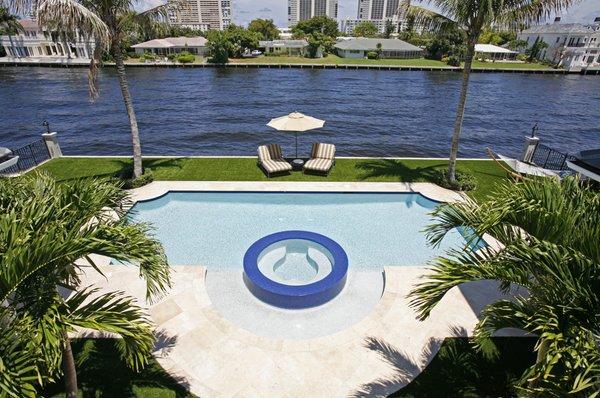 Leveling off the backyard with a Vanishing Edge dock has become more and more popular with Luxury Homes in the Broward and Palm Beach Areas