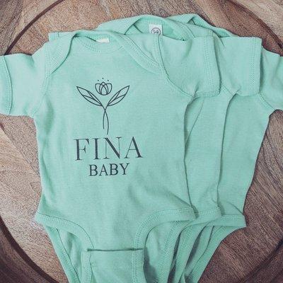 We are loving our new #FINA onesies and can't wait to gift these to our patients who graduate from our program!