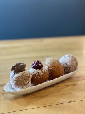 Donut holes (Mexican chocolate, jelly filled, lemon filled, cinnamon sugar)