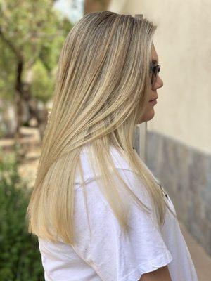 Formerly a solid blonde. We added baby lights for a softer transition