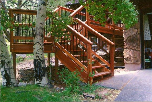 Some pretty tricky new redwood steps going up to a new redwood deck