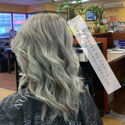 Silver Blonde balayage with purple tones!