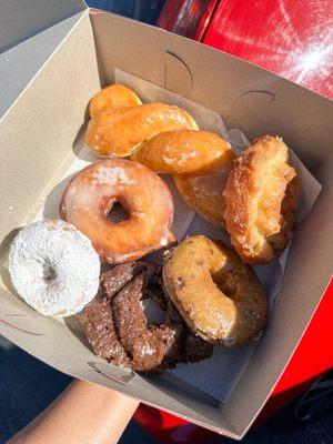 Assorted donuts: raised, old fashioned, cake and cronut