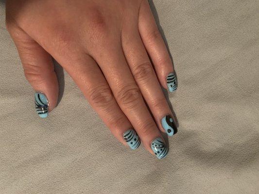 New nail designs! Ying and Yang with a flavor of baby blue, one my favorite color!