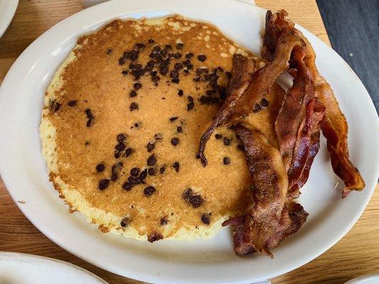 Pancake with Additional Chocolate Chips, and a side of Bacon.