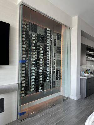 Frameless glass for refrigerated enclosed wine display