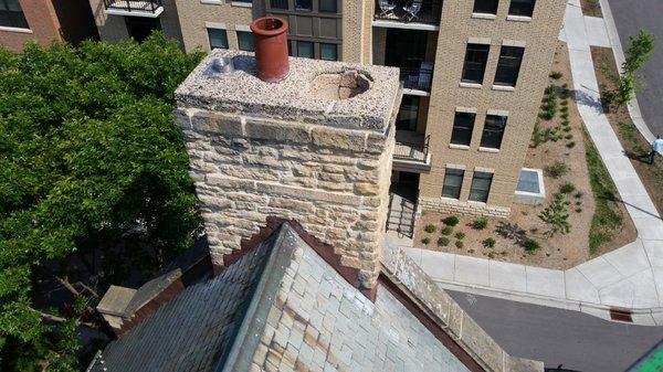 Chimney needed to be tuck pointed andrequiring a 52' 18" stainless flue for the boiler to prevent further deterioration of the mortar joints