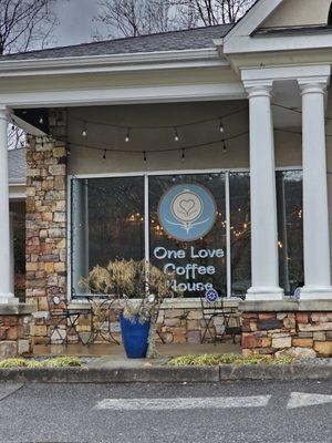 The  front window of One Love Coffee House.