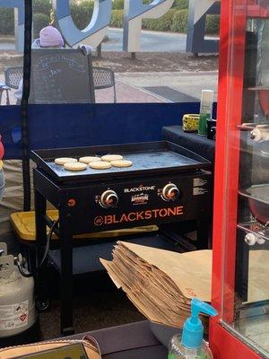 Arepas on the grill.