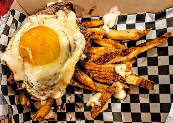 Steak Frites: Flank Steak, Fries, Sunny Side Egg, IPA-ioli. $22