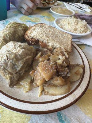 Cabbage rolls. Fried potatoes. bread. kraut.