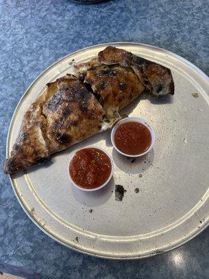 Calzone - sausage, grilled chicken, black olives.