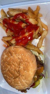 Santino Burger with pickles, fried onions, lettuce, and tomato, and chipotle mayo