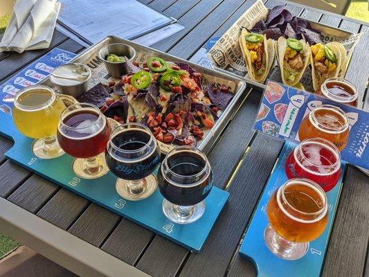 Flights of beers, chorizo nachos, mahi tacos.