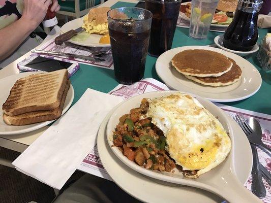 Tex mex scramble (chorizo) with side of pancakes and order of toast.