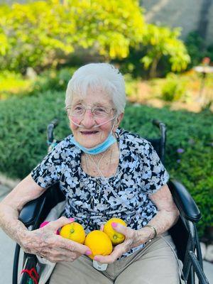 Mom enjoying the garden at The Villas