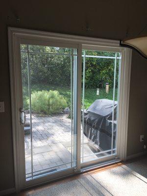 Sliding patio door with single prairie grid.