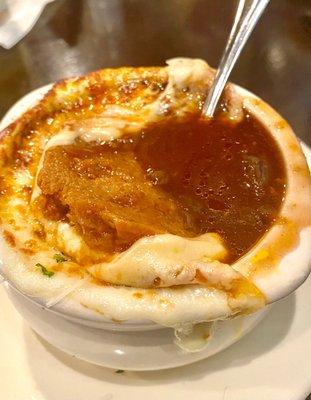 Inside the French onion soup, rich dark beef broth.. so good!!