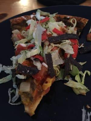 Taco pizza! I added lettuce shreds and tortilla strips with a drizzle of Tapitio!!!!