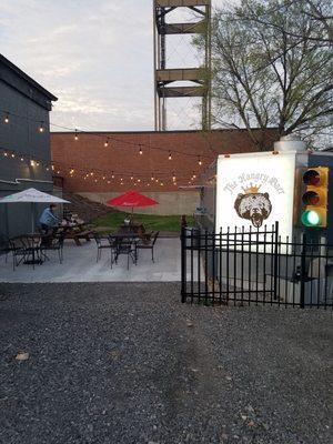 Entry to downstairs outdoor patio area, complete with window to order food and some beverages