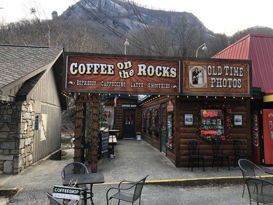 Outside and seating with few of Chimney Rock in the background (upper left corner)