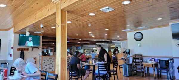 interesting. The dining room has an old fashioned rustic look, but the kitchen looks modern.