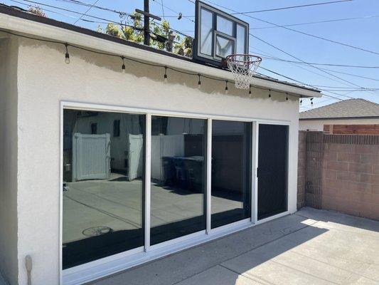 IWC Ambassador series multi-slide door installed into garage door opening.