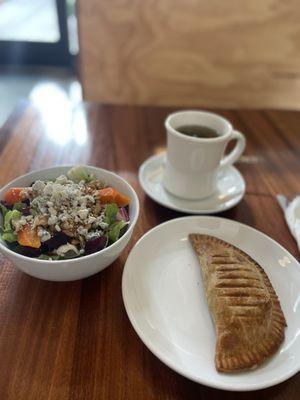 Beet and blue cheese salad (delicious), breakfast empanada, and tea.