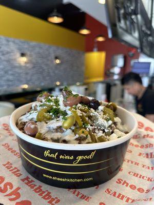 Beef Greek salad bowl with tahini sauce