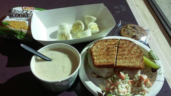 Clam chowder, hard boiled eggs, oatmeal cookie, turkey rachel with blue cheese slaw...