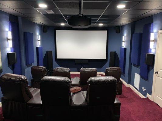 This was a complete Dolby Atmos theater with custom acoustic treatment. We even replaced the sconce lights!