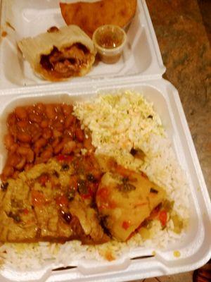 Beef lunch over rice with beans,coselaw, empanada, and a tamali. Amazing.