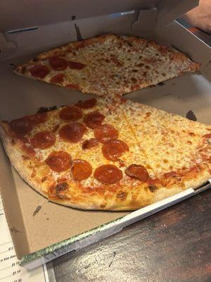 Half pepperoni and half cheese. Very delicious pizza.