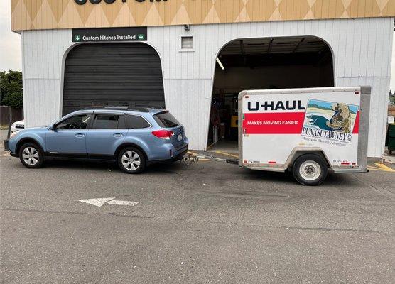 car with uhaul trailer