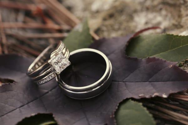 Custom engagement ring and wedding band.  Men's wedding band also purchased at Jewelry Artisans