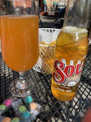 outdoor seating, chips, and beer!