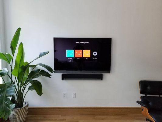 OLED TV custom installation.
Cable box was installed behind the TV (in the wall), and controlled with IR extender.