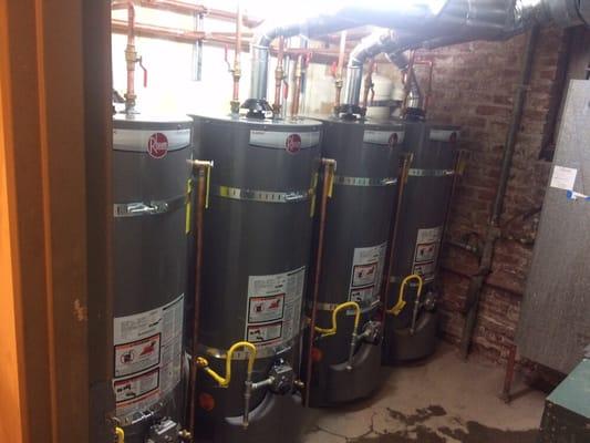 Four Rheem Water heaters installed for apartment building.