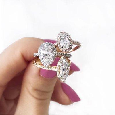 Rose Gold Oval, Platinum Pear-Shaped, and Yellow Gold Marquise Halo Engagement Rings