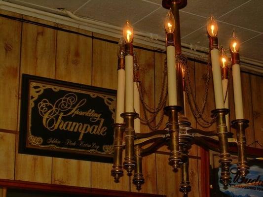 How can you not like a place with a Champale sign,  simulated wood panels and a chandelier?!?!